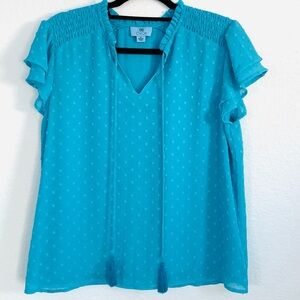 CeCe aqua swiss dot blouse with ruffle sleeves and a v-neck with tassel ties